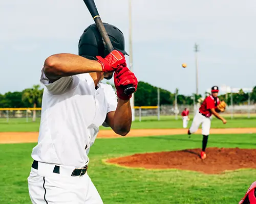 Baseball Player Hitting