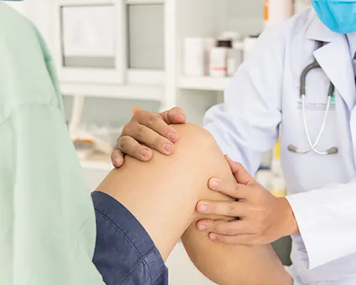 Doctor with Knee Patient