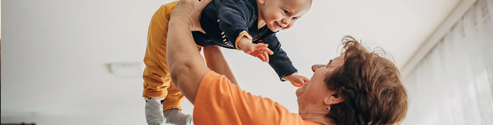 Hand & Upper Extremity - Grandparent Holding Baby