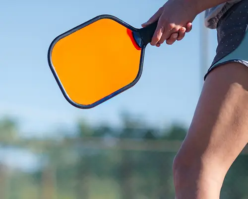 Pickleball Injuries - Couple playing pickleball