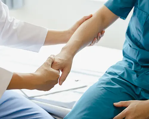 Patient Holding Provider Hand